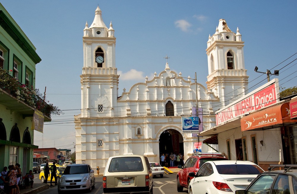 Architecture In Panama Image: This beautiful white cathedral is rather simple for its style, and is just another part of this busy city street.