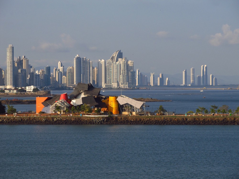 Architecture In Panama Image: Another view of the Gehry building shows us Panama City's architectural skyline, which includes cylinders, and a curved wedge. 