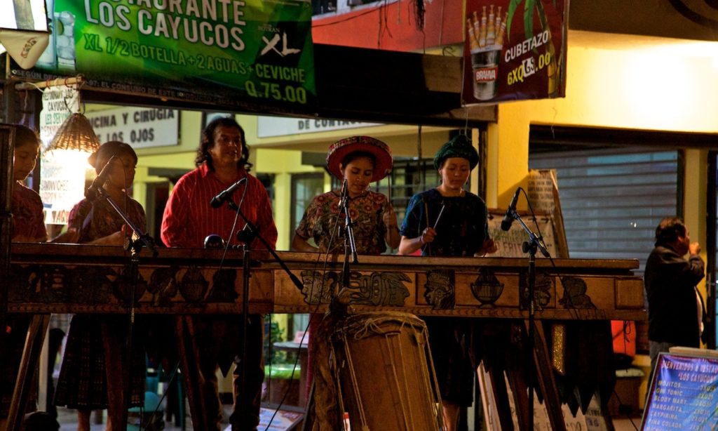 Guatemala Dream Vacation: A musical group plays outdoors on a sultry night.