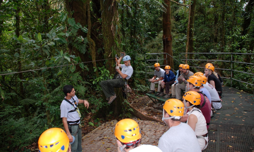 Costa Rica Adventure Trips Image: Zip liners sit, and patiently observe and listen to instructors.