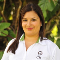 Sirleny Zuñiga-Vargas is pictured smiling sweetly. Her brown hair falls over her shoulder.