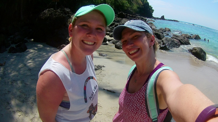 Costa Rica Mother's Day Image: The author's daughter and granddaughter smile in tank tops and baseball caps on one of Manuel Antonio National Park's beaches.