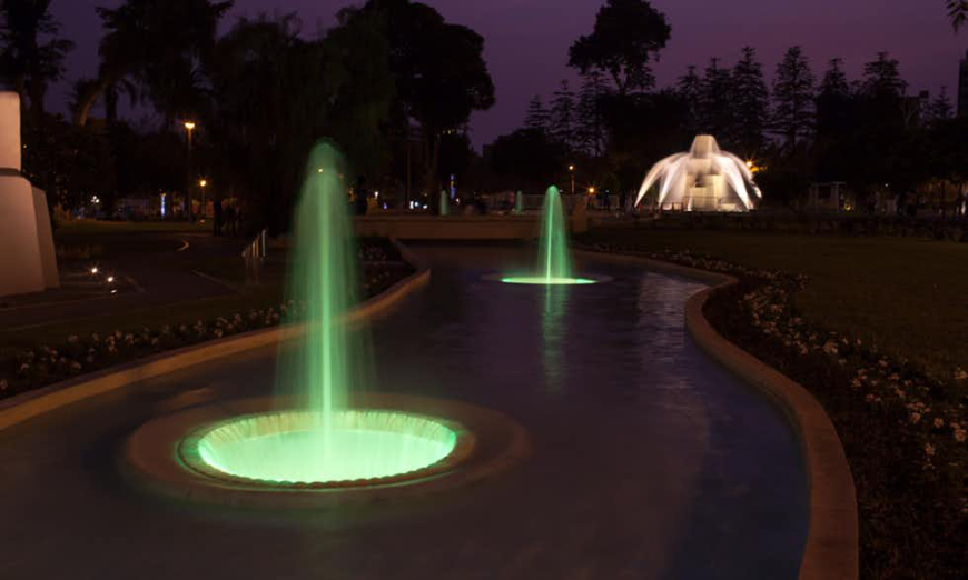 Lima Nightlife Image: Lima's fountains lit up at night.