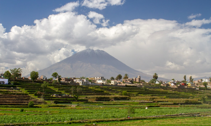 Peru Group Tour Image: Arequipa from a distance, with a mountain in the background.