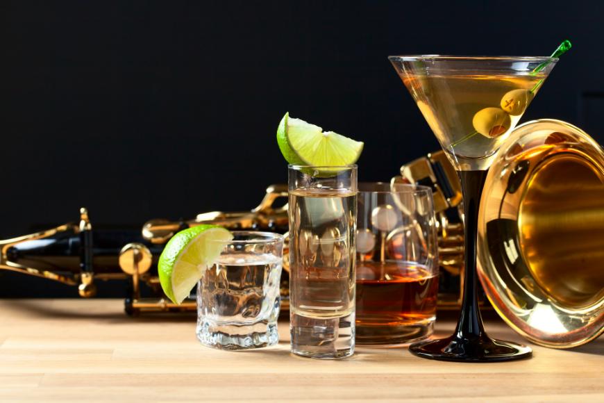 Salsa Dancing in Cuba: Assorted cocktails are posed in front of a saxophone.