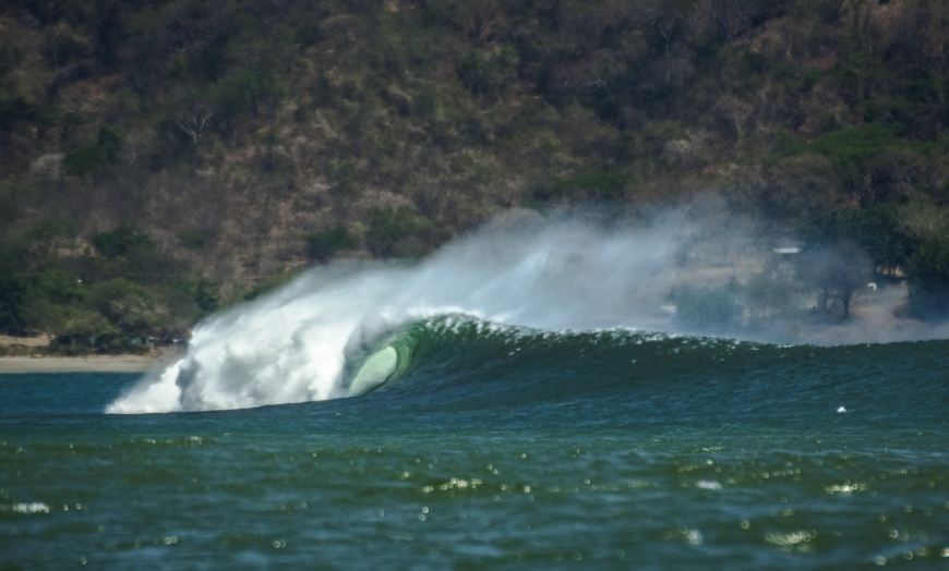 Summer In Panama Image: A barreling wave rolls along.