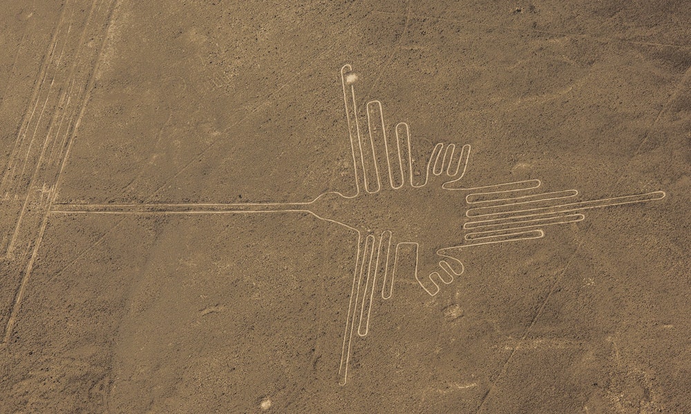 Unique Peru Image: An ancient depiction of a hummingbird in the landscape.